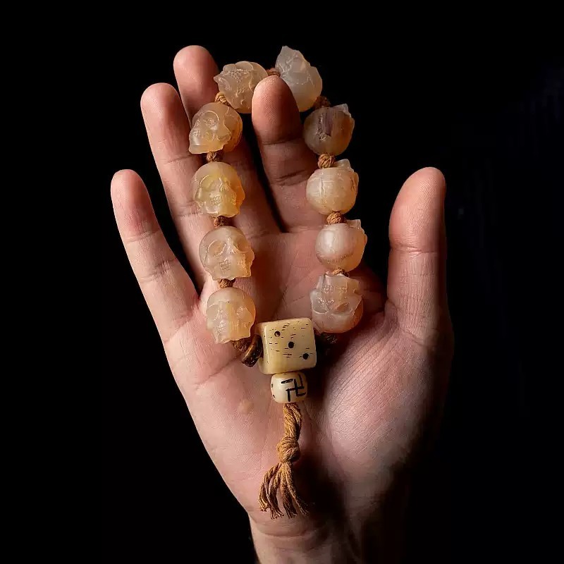 Shitro Lord Bone Bracelet: Tibetan Handcarved Goat Horn Mala with Yak Bone Skull Accents