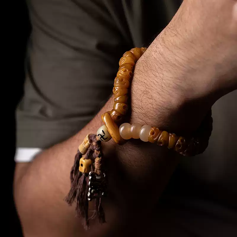 Tibetan Slant-Cut Yak Bone Skull Mala Bracelet – Charnel Ground Master Beads with Tassel