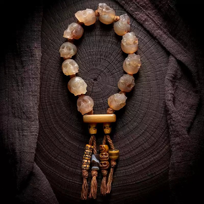 Shitro Lord Bone Bracelet: Tibetan Handcarved Goat Horn Mala with Yak Bone Skull Accents