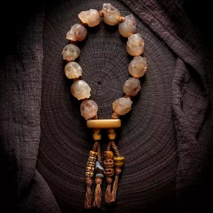 Shitro Lord Bone Bracelet: Tibetan Handcarved Goat Horn Mala with Yak Bone Skull Accents