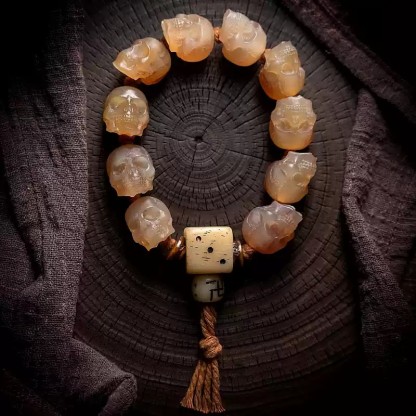 Shitro Lord Bone Bracelet: Tibetan Handcarved Goat Horn Mala with Yak Bone Skull Accents