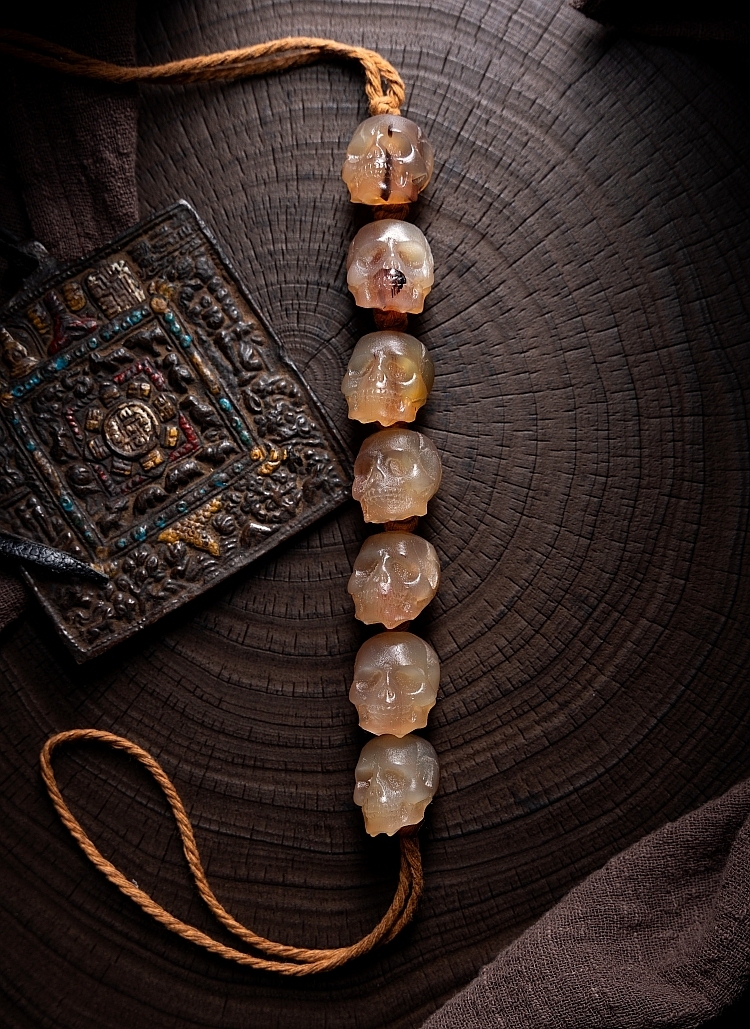 Shitro Lord Bone Bracelet: Tibetan Handcarved Goat Horn Mala with Yak Bone Skull Accents