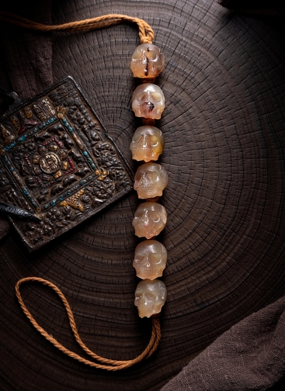 Shitro Lord Bone Bracelet: Tibetan Handcarved Goat Horn Mala with Yak Bone Skull Accents