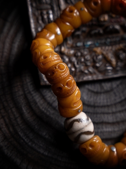 Tibetan Slant-Cut Yak Bone Skull Mala Bracelet – Charnel Ground Master Beads with Tassel