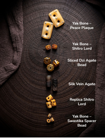 Shitro Lord Bone Bracelet: Tibetan Handcarved Goat Horn Mala with Yak Bone Skull Accents