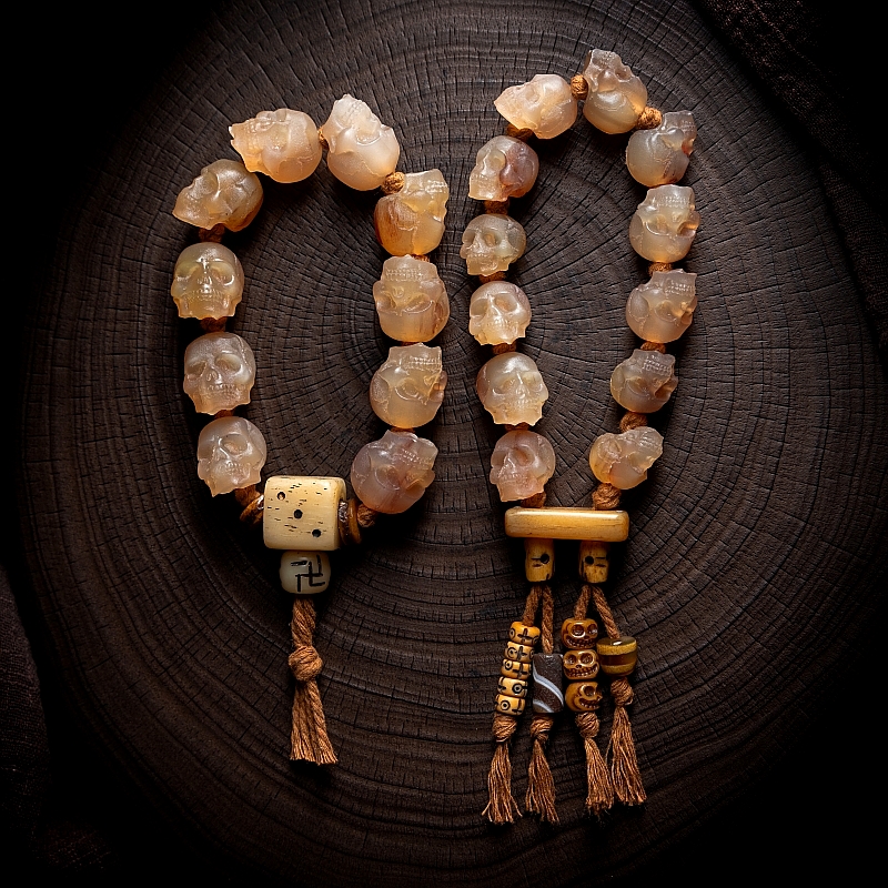 Shitro Lord Bone Bracelet: Tibetan Handcarved Goat Horn Mala with Yak Bone Skull Accents