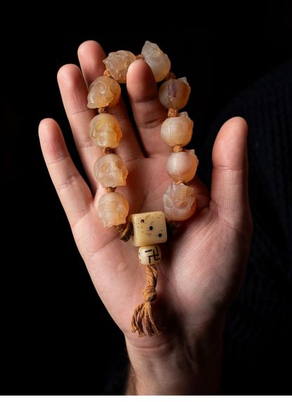 Shitro Lord Bone Bracelet: Tibetan Handcarved Goat Horn Mala with Yak Bone Skull Accents