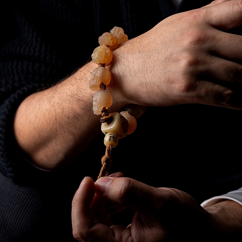 Shitro Lord Bone Bracelet: Tibetan Handcarved Goat Horn Mala with Yak Bone Skull Accents