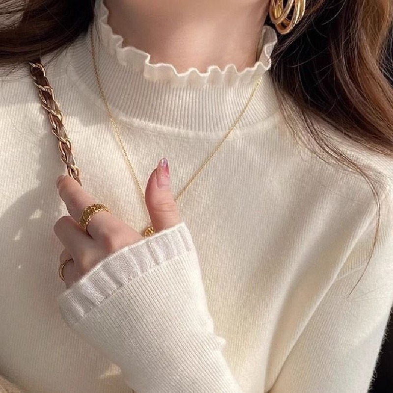 設計感蕾絲半高領拼接木耳邊羊絨針織衫