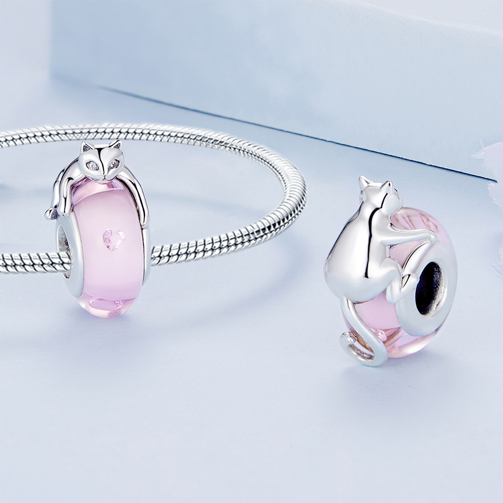 Cat Lying on Pink Glass Charm image number 2
