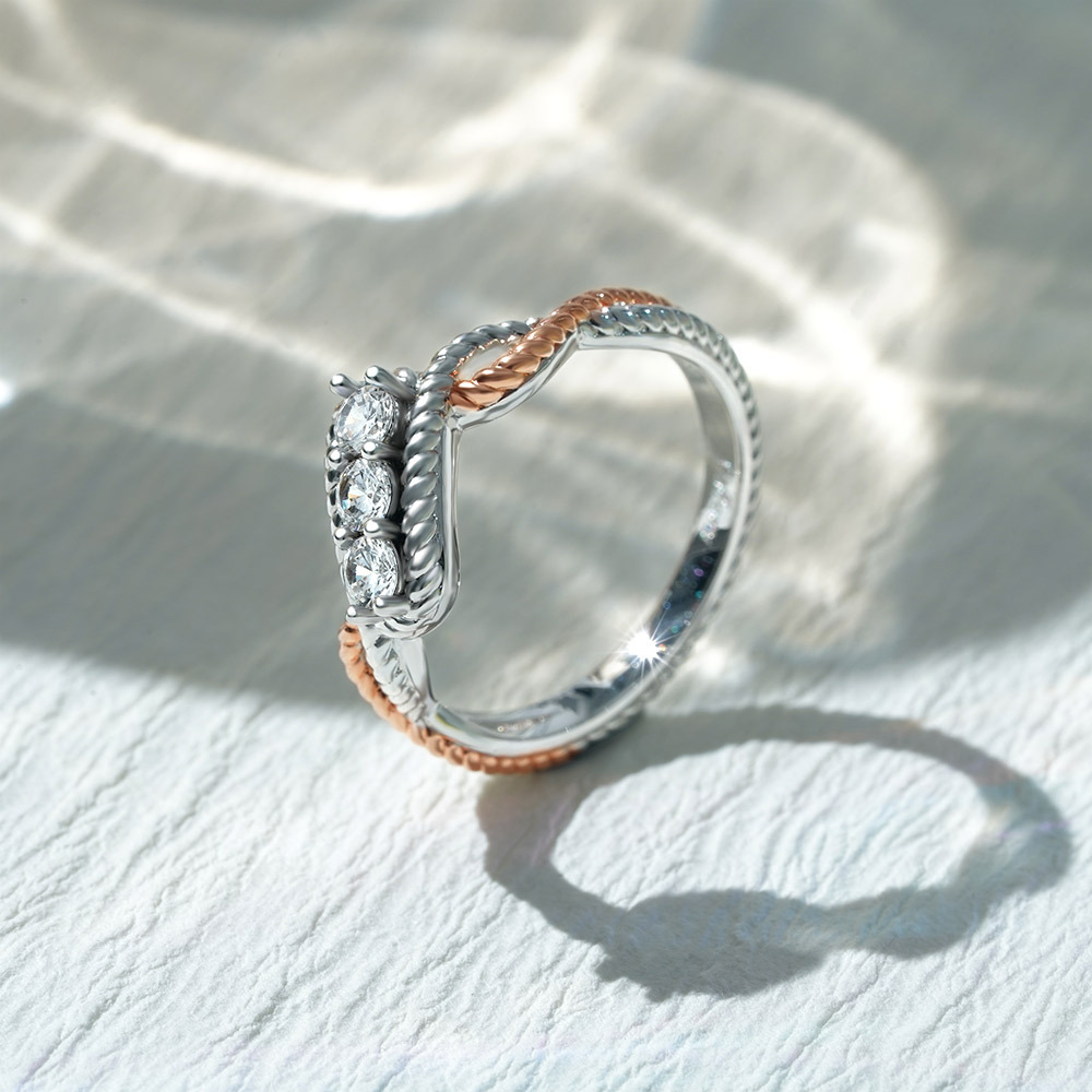 Three Stone Twisted Infinity Ring image number 3