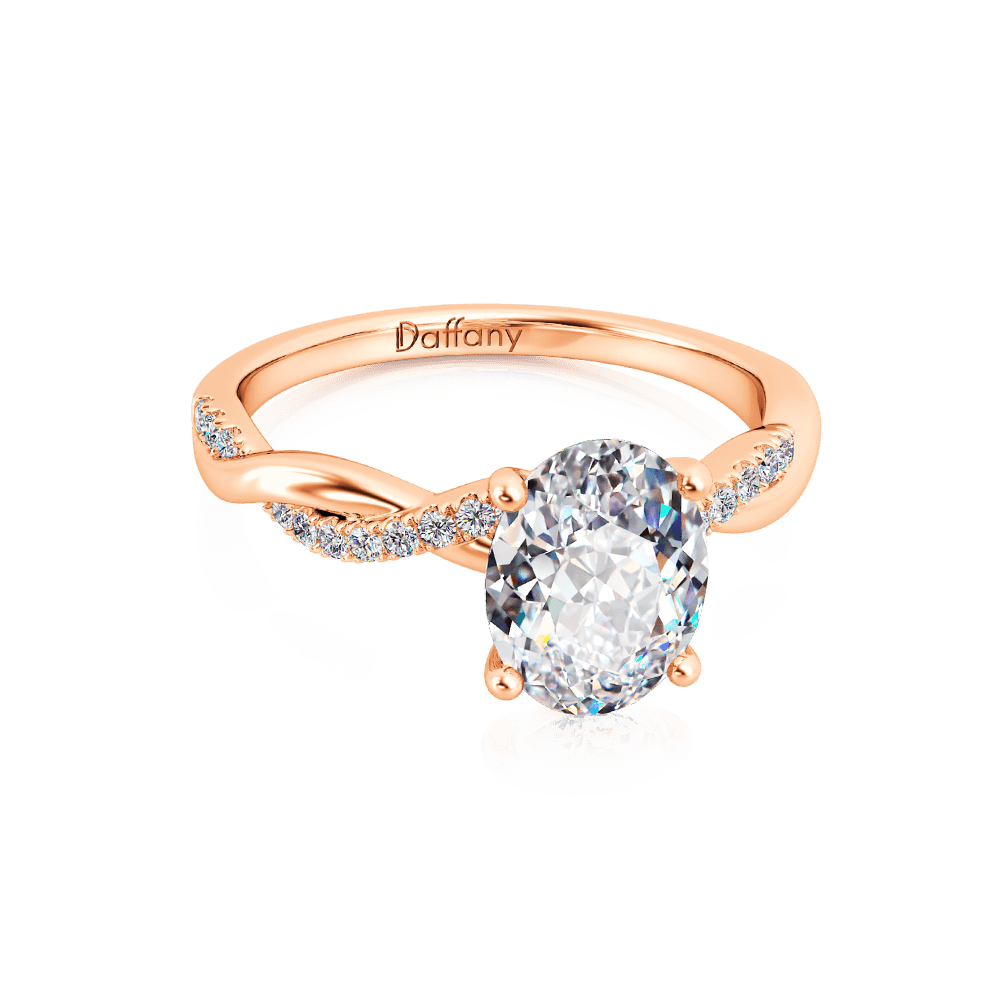 Solitaire Oval Cut Twisted Infinity Ring image number 1