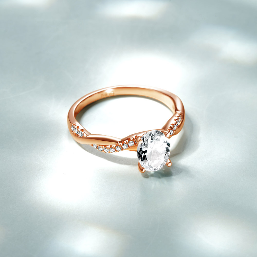 Solitaire Oval Cut Twisted Infinity Ring image number 3