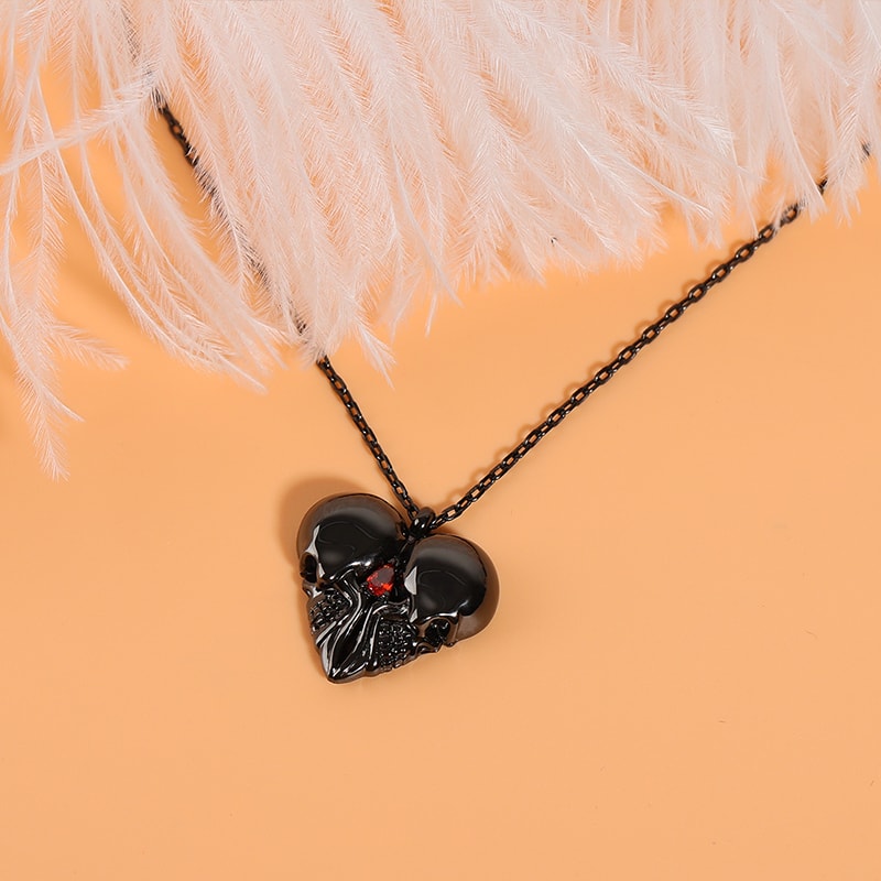 Heart Shaped Double Skull Necklace image number 1