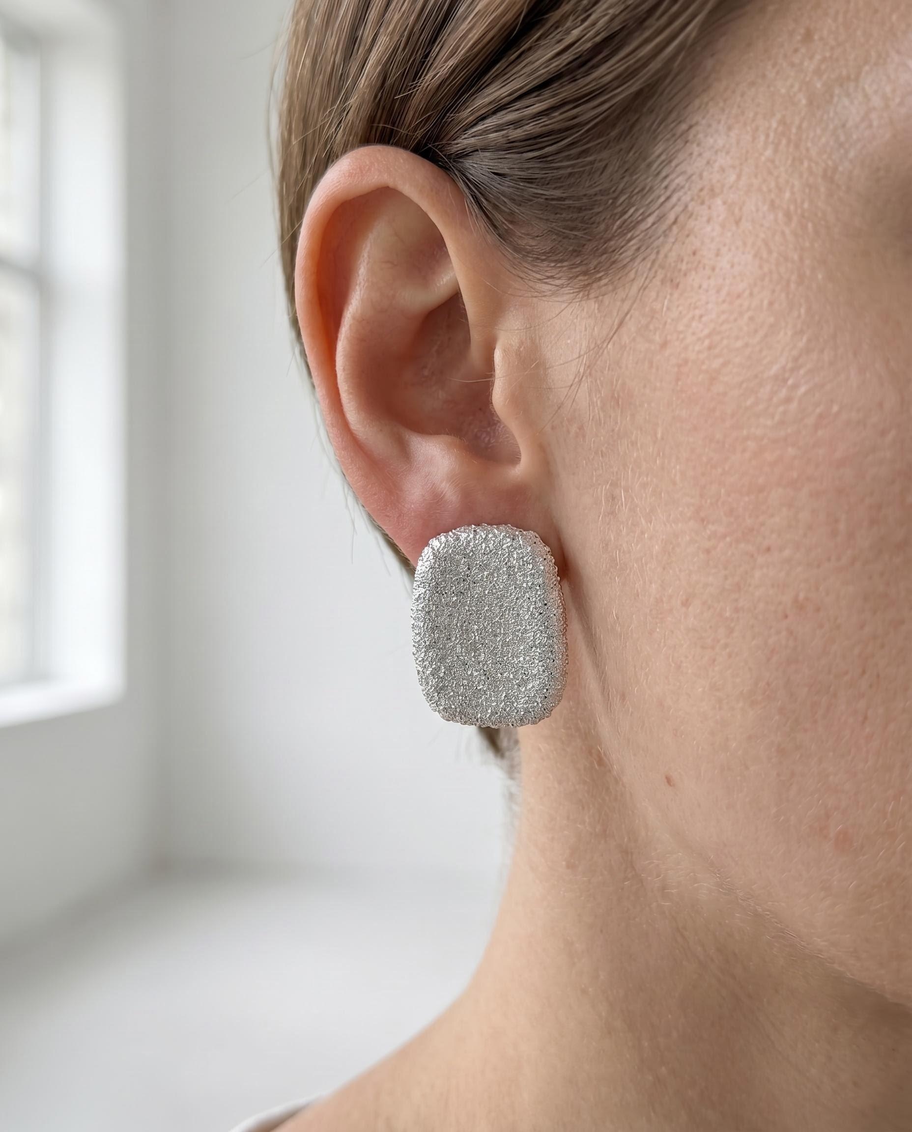 The "Awareness" Star Dust – Matte Silver Rectangular Studs with Micro‑Sparkle