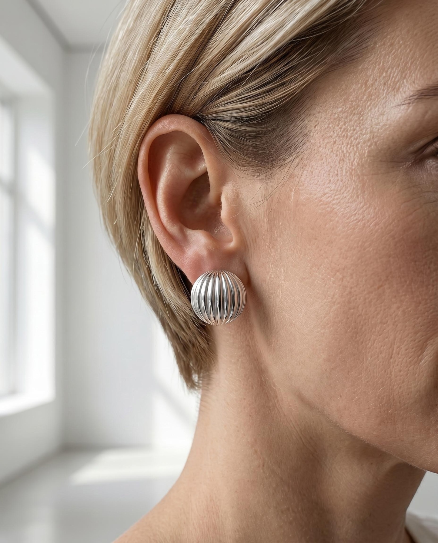 The "Clarity" Faceted Sphere – High‑Polish Silver Geometric Studs
