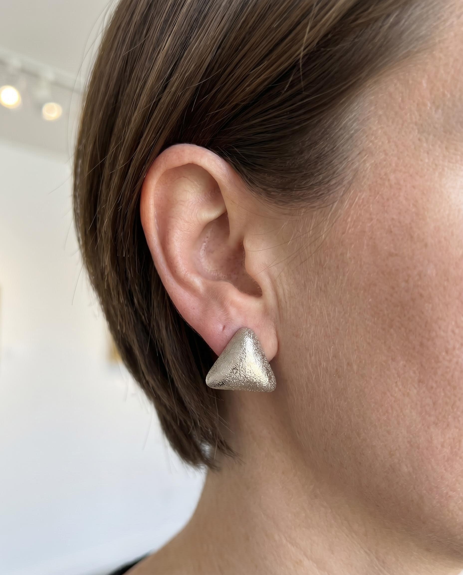 The "Clarity" Triangle – High‑Polish or Matte Gold Studs