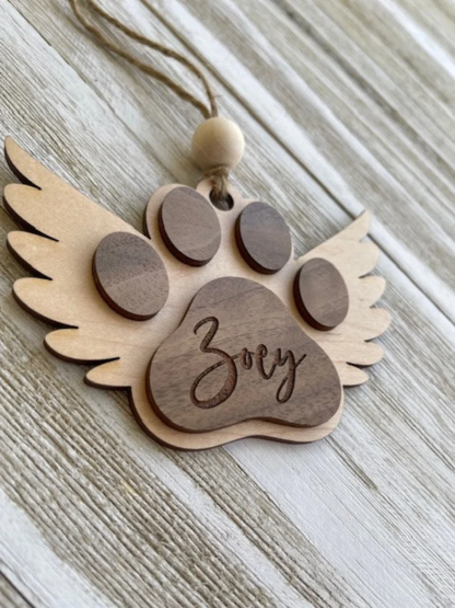 1pc  Personalized Paw Remembrance Ornament for Pet Lovers, Engraved Name, Wooden Pet Memorial Ornament, Rustic Angel Wings Design, Round Shape, Ideal for Christmas, Birthdays, Anniversaries, and Pet Memorial Day