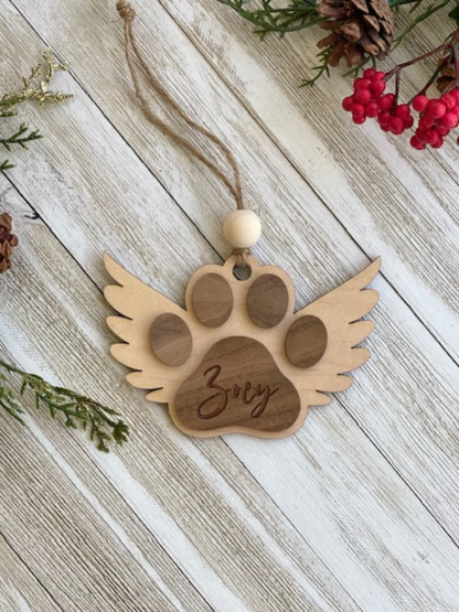 1pc  Personalized Paw Remembrance Ornament for Pet Lovers, Engraved Name, Wooden Pet Memorial Ornament, Rustic Angel Wings Design, Round Shape, Ideal for Christmas, Birthdays, Anniversaries, and Pet Memorial Day