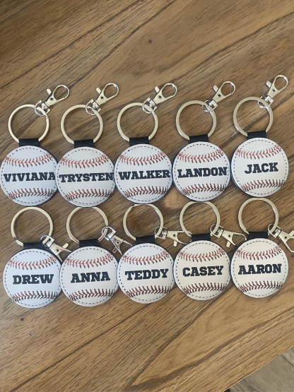 1PC Compact Custom Name Baseball Keychain,Personalized Faux Leather Sports Key Ring for Him, Classic Baseball Stitch Design with Engraved Name or Jersey Number, Durable Handmade Round Key Fob with Red Stitch Embroidery, Minimalist Sports Gift for Coach, T