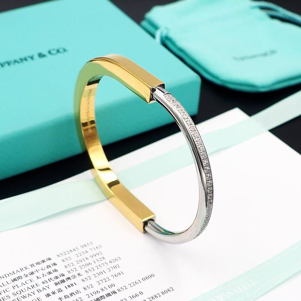 ティファニー ロック バングル イエローゴールド ＆ ホワイトゴールドにハーフ パヴェ ダイヤモンドをセッティング