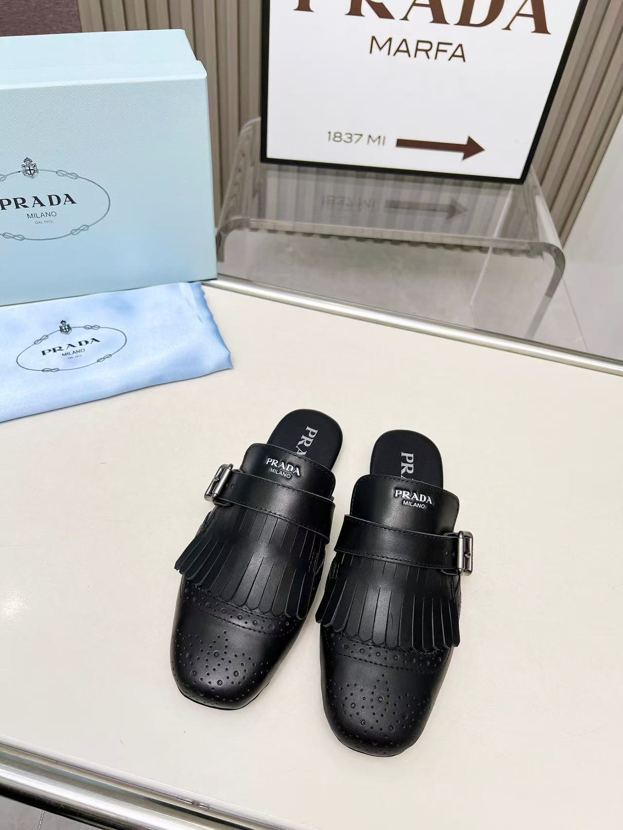 Prada プラダ シャッフル フリンジ付 レザー ミュール