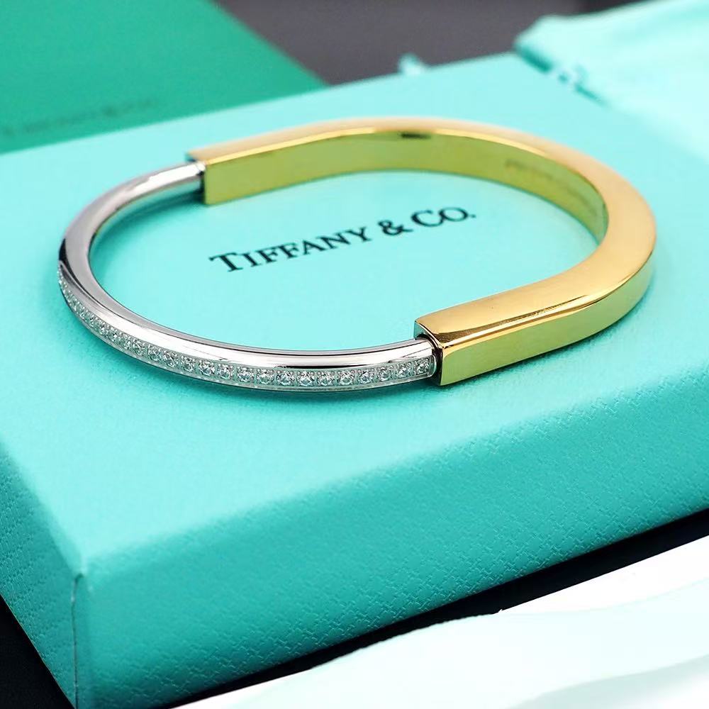 ティファニー ロック バングル イエローゴールド ＆ ホワイトゴールドにハーフ パヴェ ダイヤモンドをセッティング