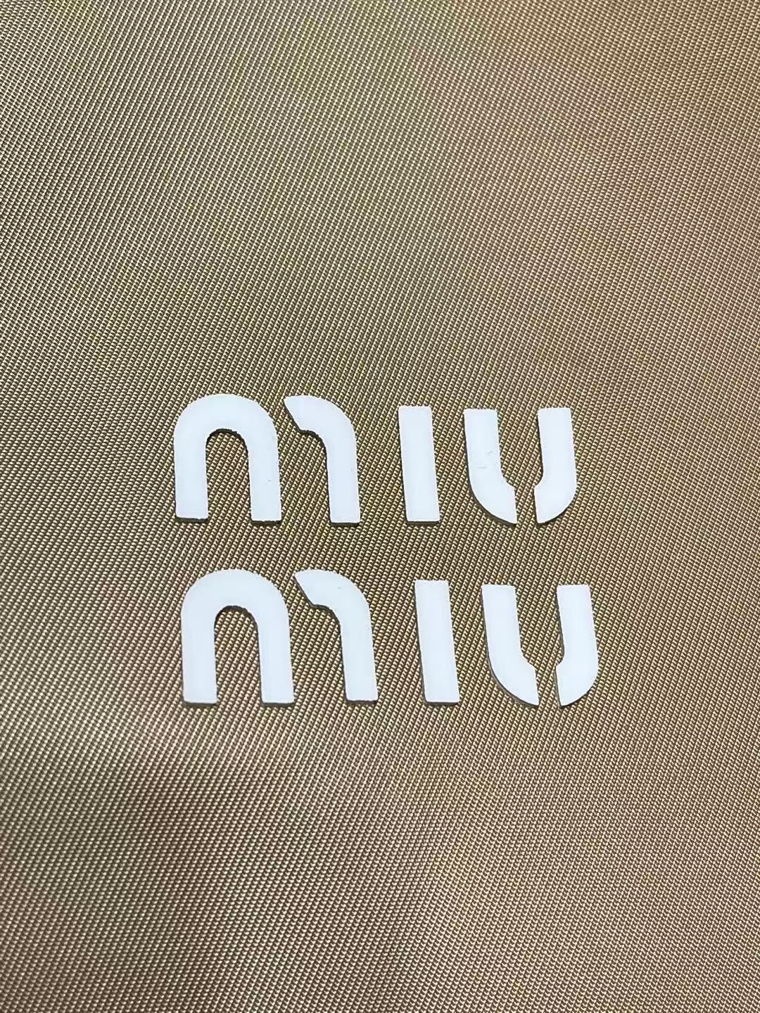 MIUMIU テクニカルファブリック ブルゾンジャケット