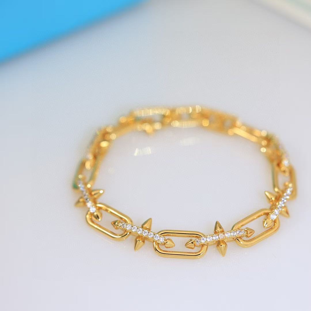 ティファニー タイタン by ファレル・ウィリアムス リンク ブレスレット ゴールドにダイヤモンドをセッティング