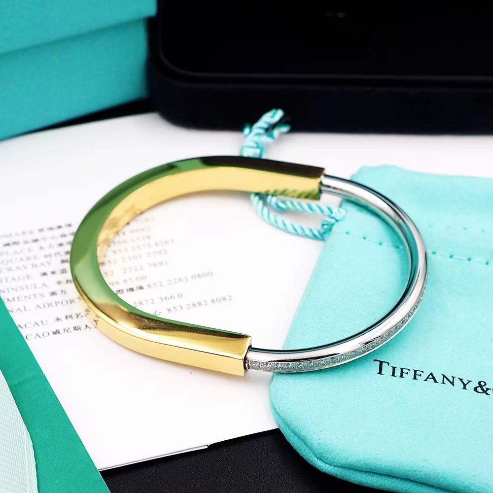 ティファニー ロック バングル イエローゴールド ＆ ホワイトゴールドにハーフ パヴェ ダイヤモンドをセッティング