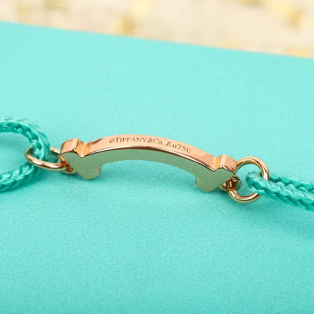 スマイル ブレスレット イエローゴールドにダイヤモンドをセッティング、ブルー コード