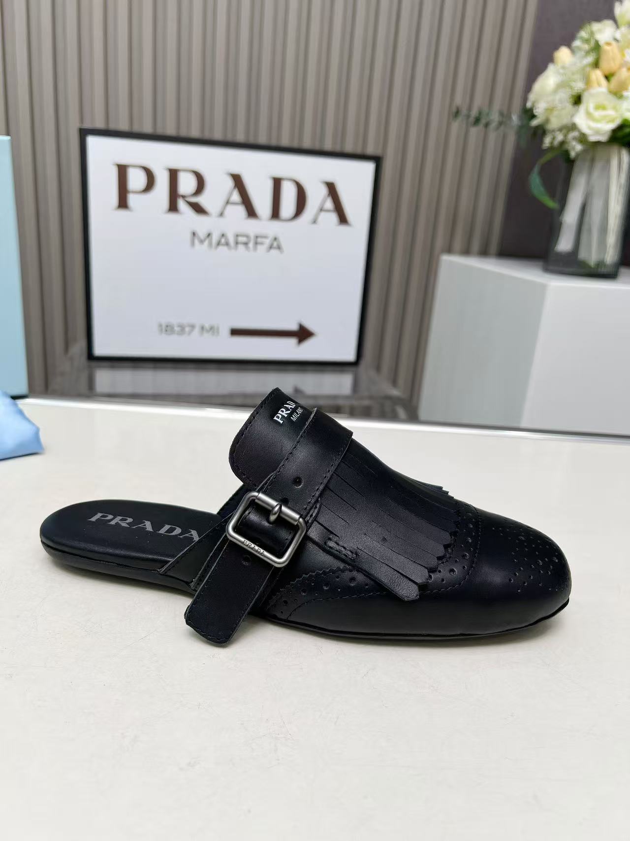 Prada プラダ シャッフル フリンジ付 レザー ミュール