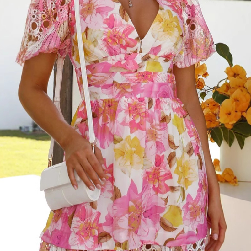 Women's dress with vibrant print, V-neck and openwork pattern
