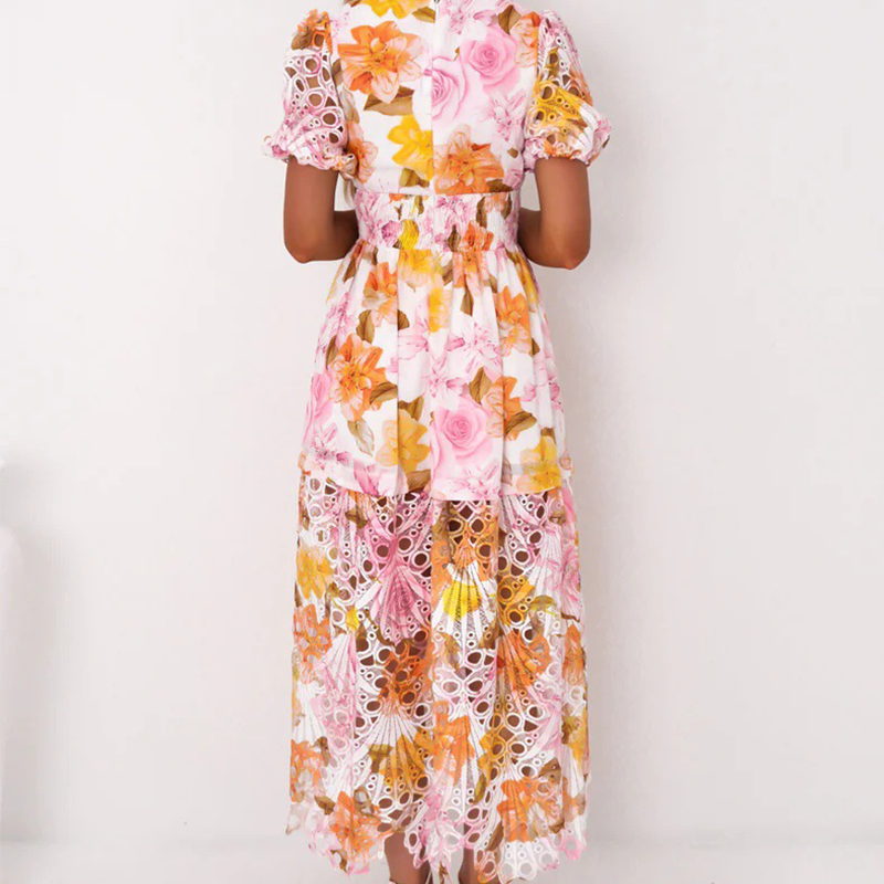 Women's dress with vibrant print, V-neck and openwork pattern