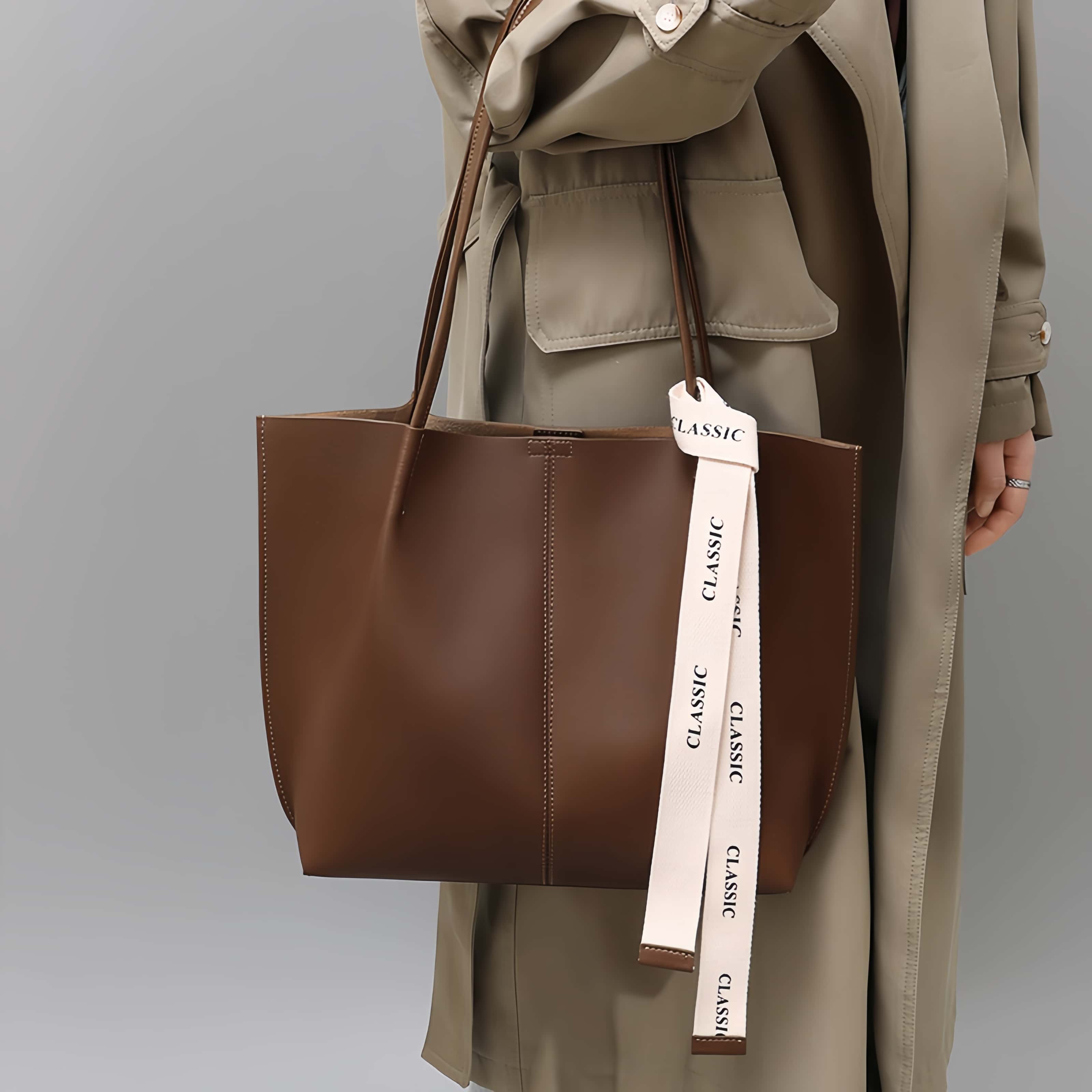 エレガントな牛革製トートバッグ ！通勤や旅行に最適の大容量仕様