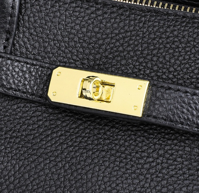 上品で洗練された牛革通勤ハンドバッグ