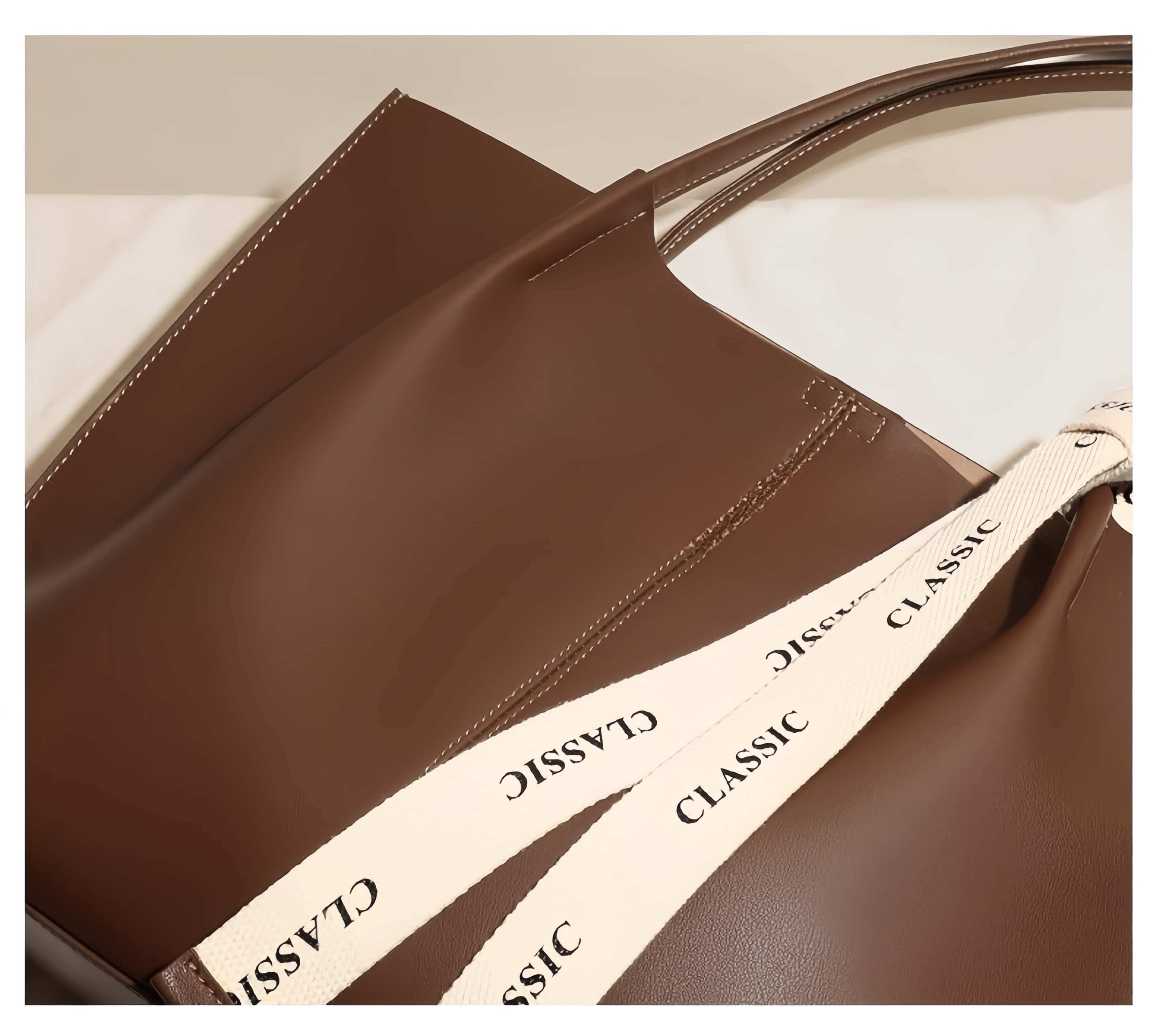 エレガントな牛革製トートバッグ ！通勤や旅行に最適の大容量仕様