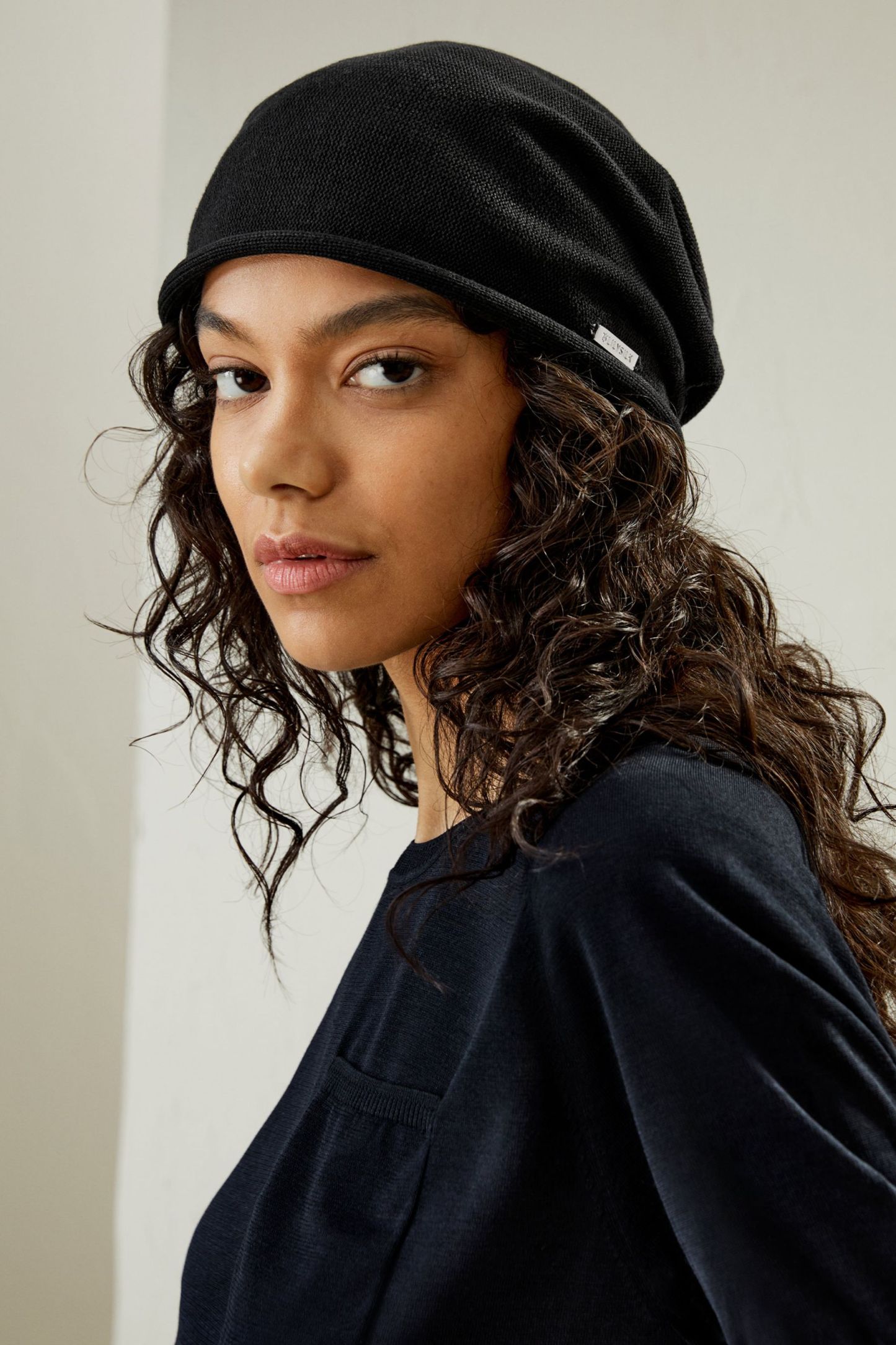 Versatile Metal Logo Silk Beanie