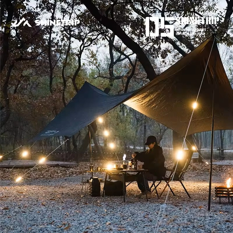 SHINETRIP 05 Series Wind Rope Warning Light attached to tent rope at night