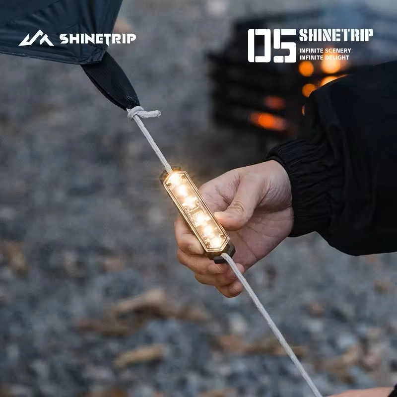 SHINETRIP 05 Series Wind Rope Warning Light attached to tent rope at night