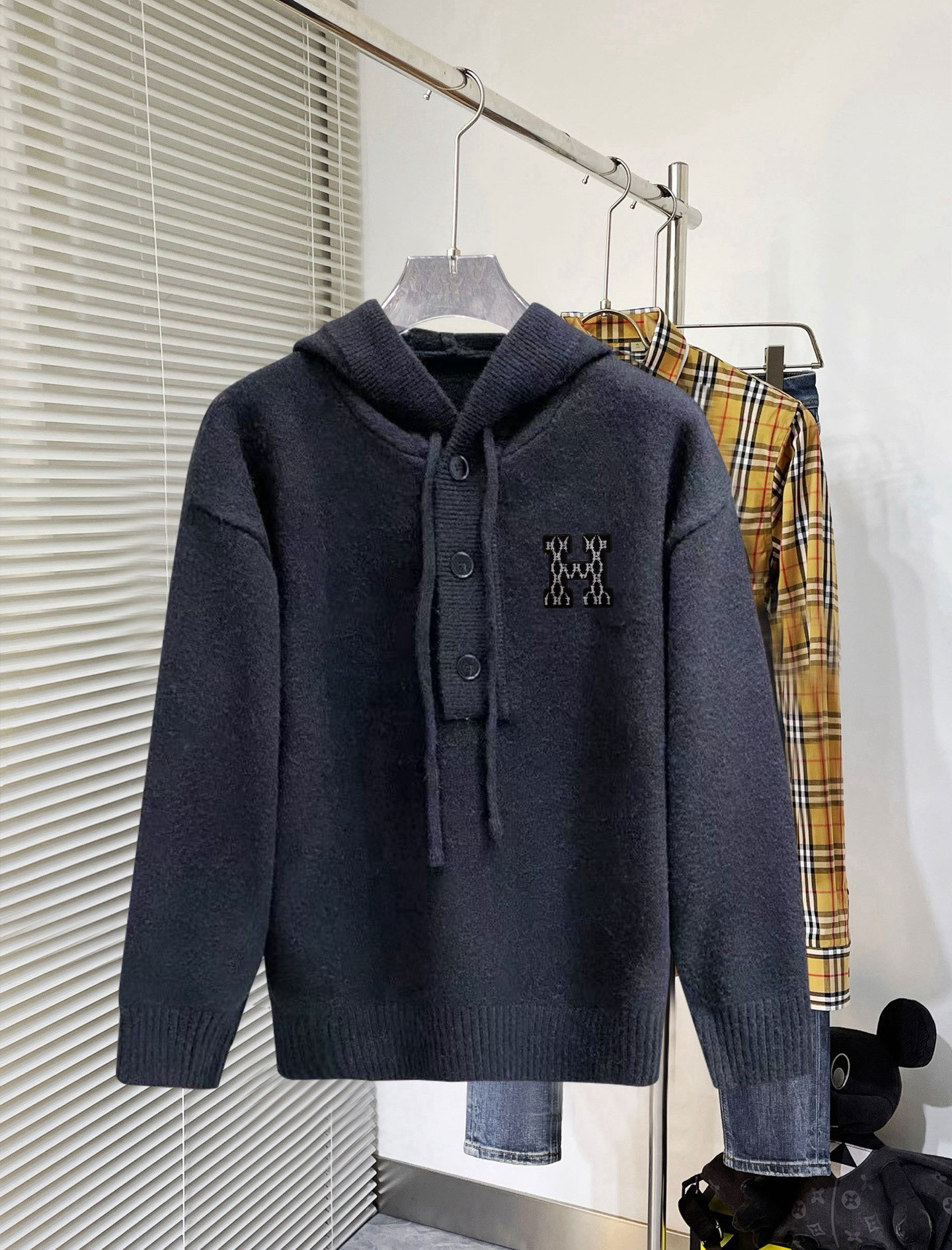 エルメス「Hermès」ロゴ フーディッド ウール ニット