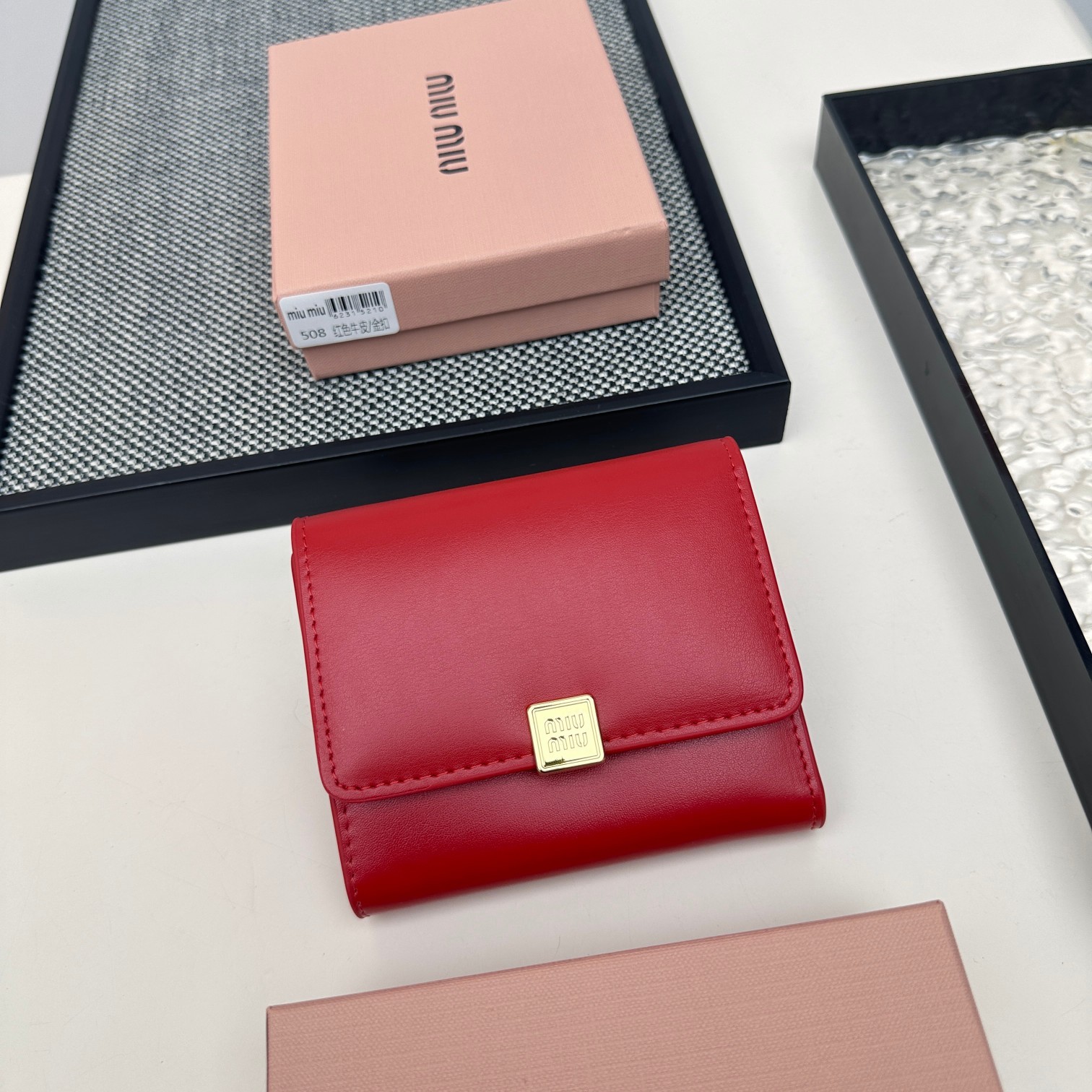 ミュウミュウ「Miu Miu」多機能二つ折りスモールウォレット-ISETAN PRESTIGE CURATED