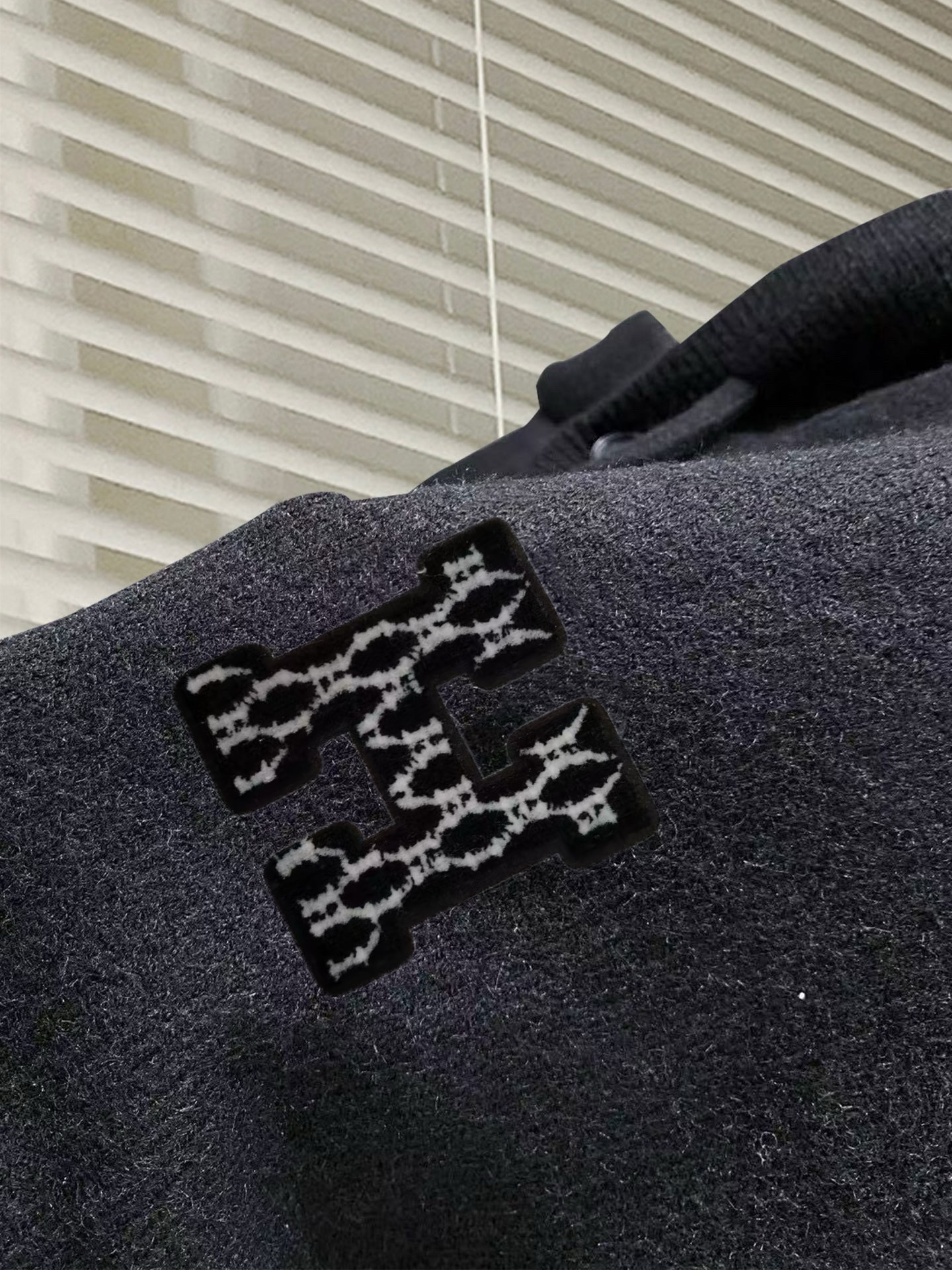 エルメス「Hermès」ロゴ フーディッド ウール ニット