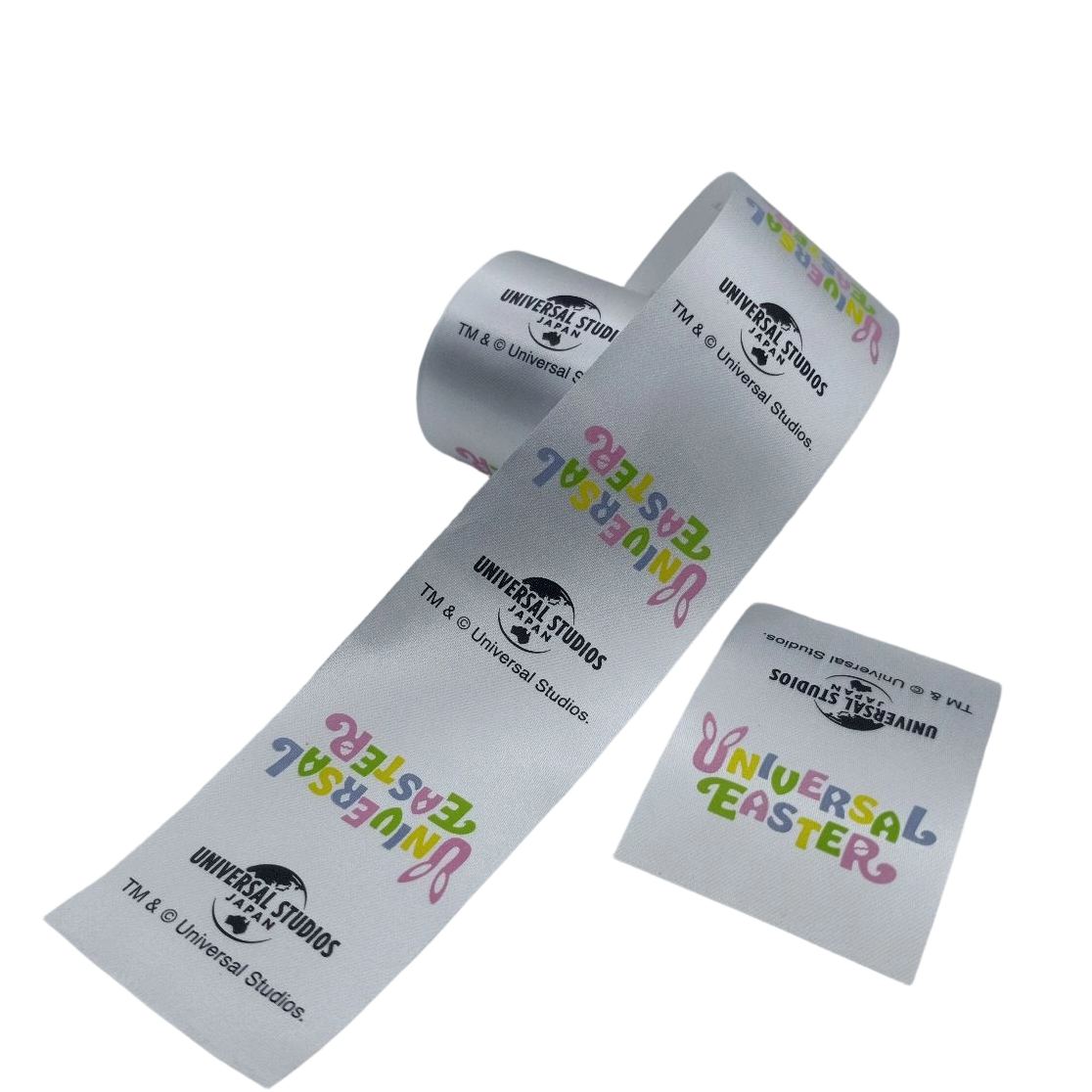Textile ribbons printed with dye ink