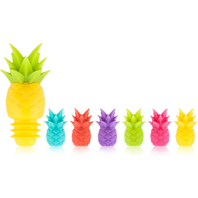 pineapple wine stopper inserted on white wine bottle tropical summer home bar scene