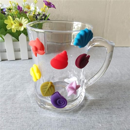 colorful silicone drink markers clipped on wine glasses home party bar display