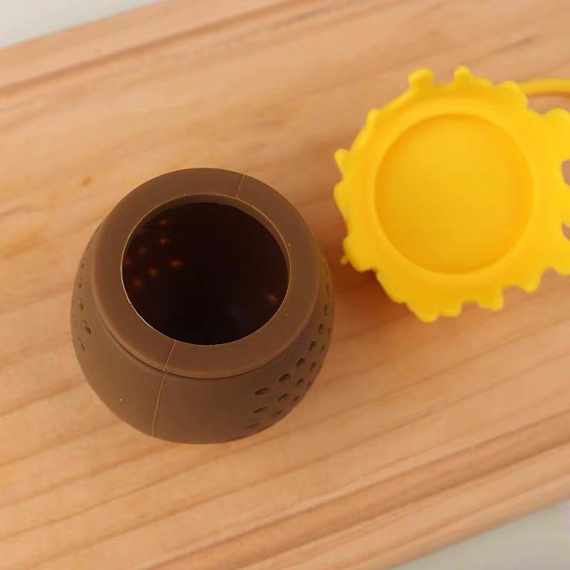 close-up honey pot tea strainer dense perforated silicone filter basket detail
