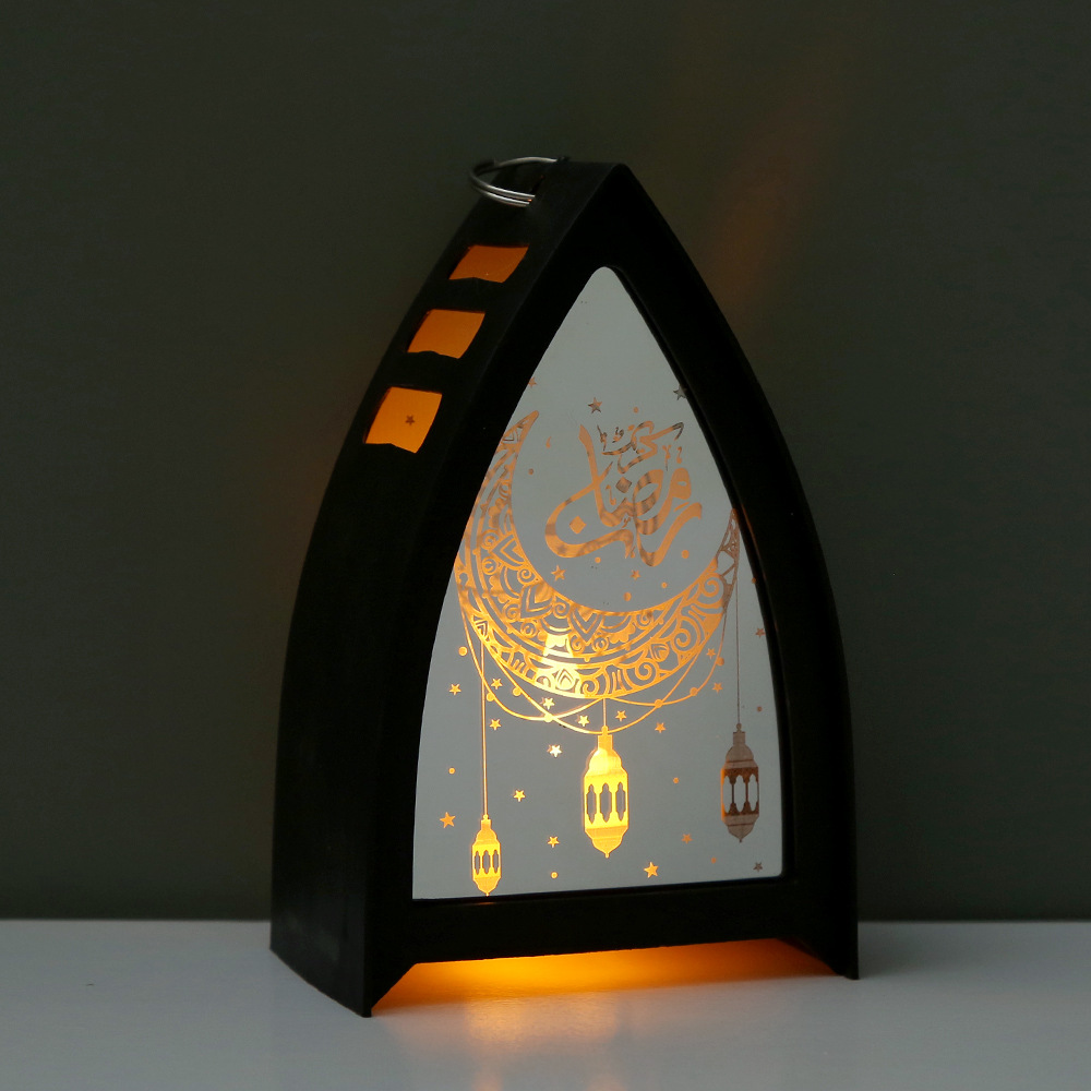 Four arch ramadan lanterns displayed on white table festive layout