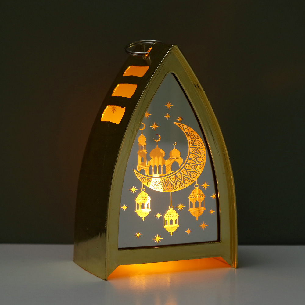 Four arch ramadan lanterns displayed on white table festive layout