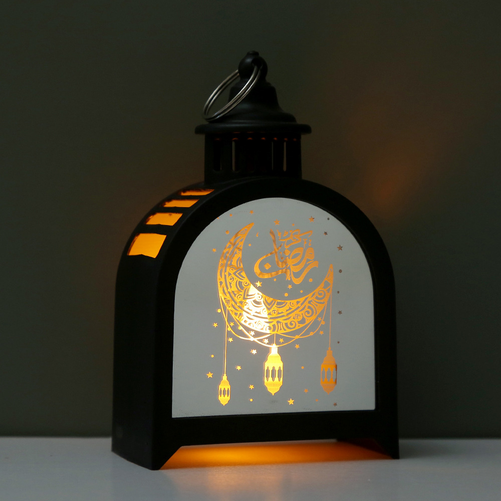 Close-up transparent panel golden crescent mosque luminous pattern and hollow side light strip